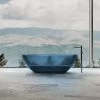 Floki 67 Inch Transparent Double Ended Solid Surface Freestanding Tub - Blue